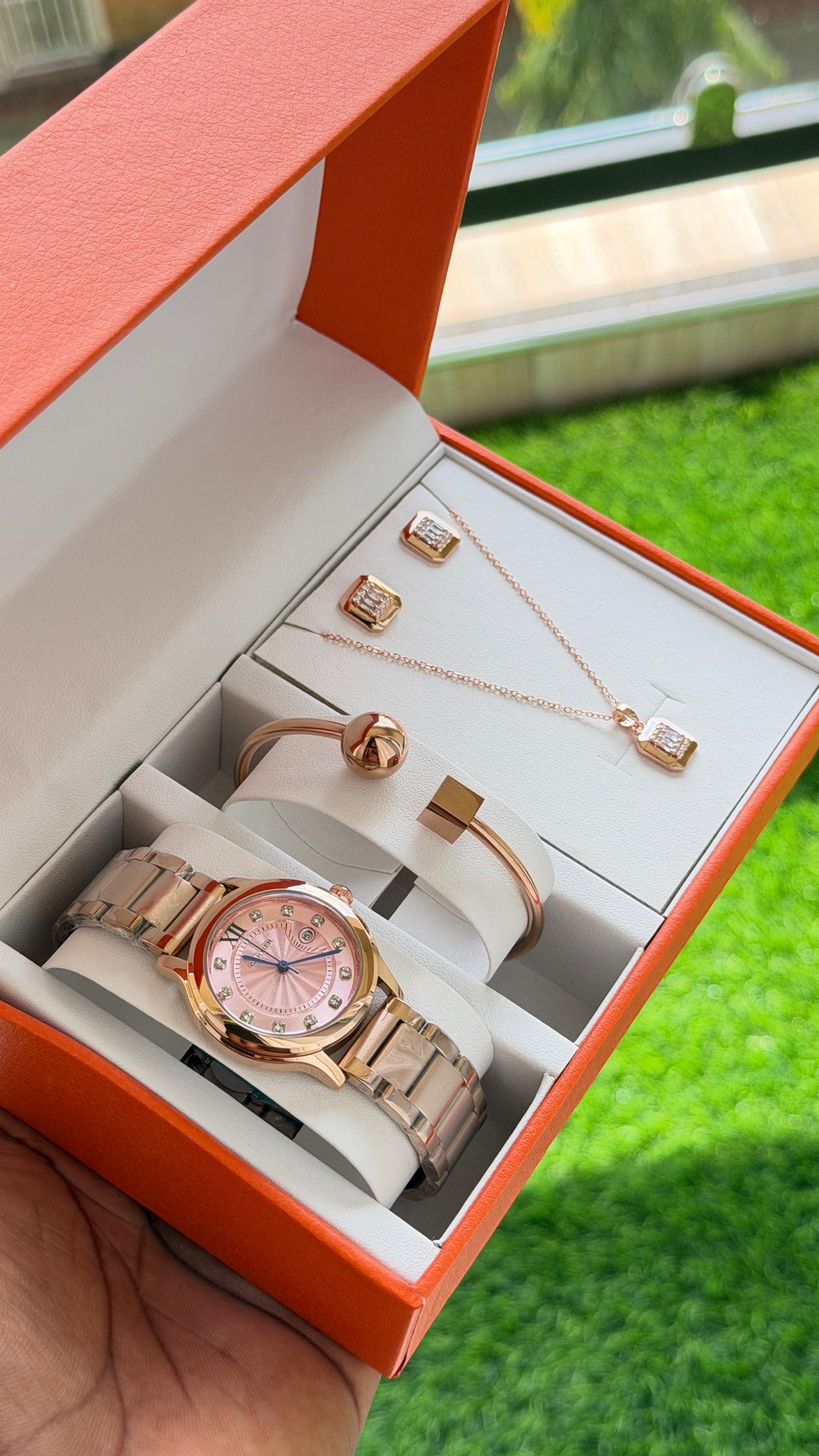 Rose-gold women's watch presented with jewellery